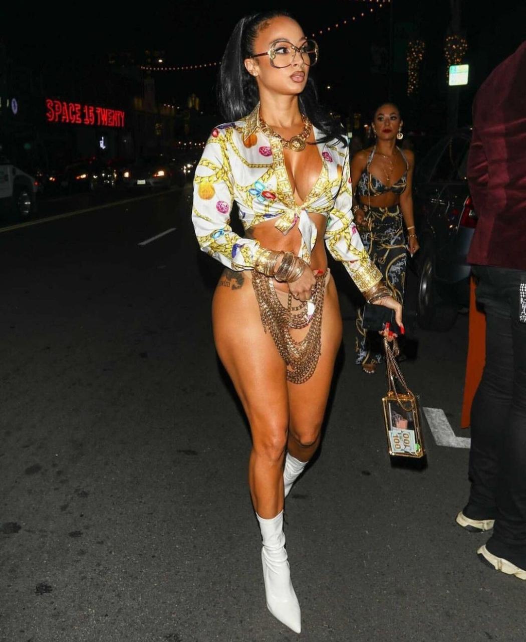 Draya Michelle turns heads as she attends event in skimpy chain skirt that covered nothing (photo)