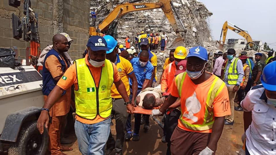 Photos and video of two male adults rescued from the scene of Ikoyi building collapse this morning