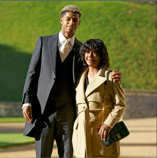 Marcus Rashford takes mum to watch him receive MBE from Prince William after free school-meals campaign (photos)