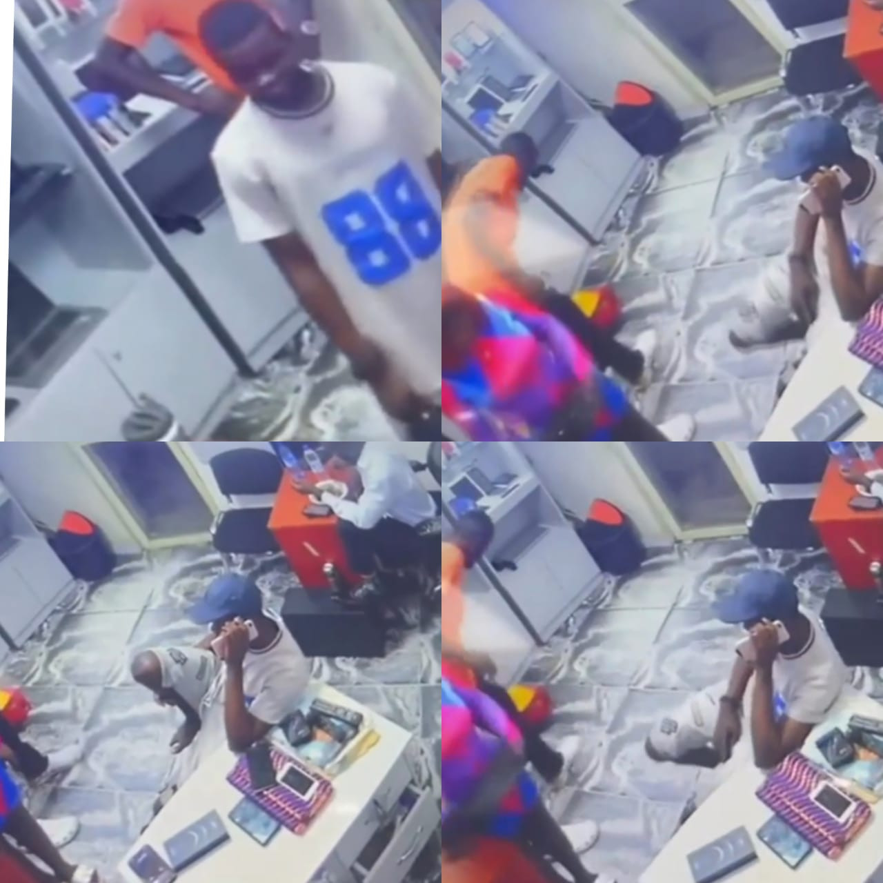 CCTV captures moment a suspected thief stole an iPhone pro max from a phone shop (video)