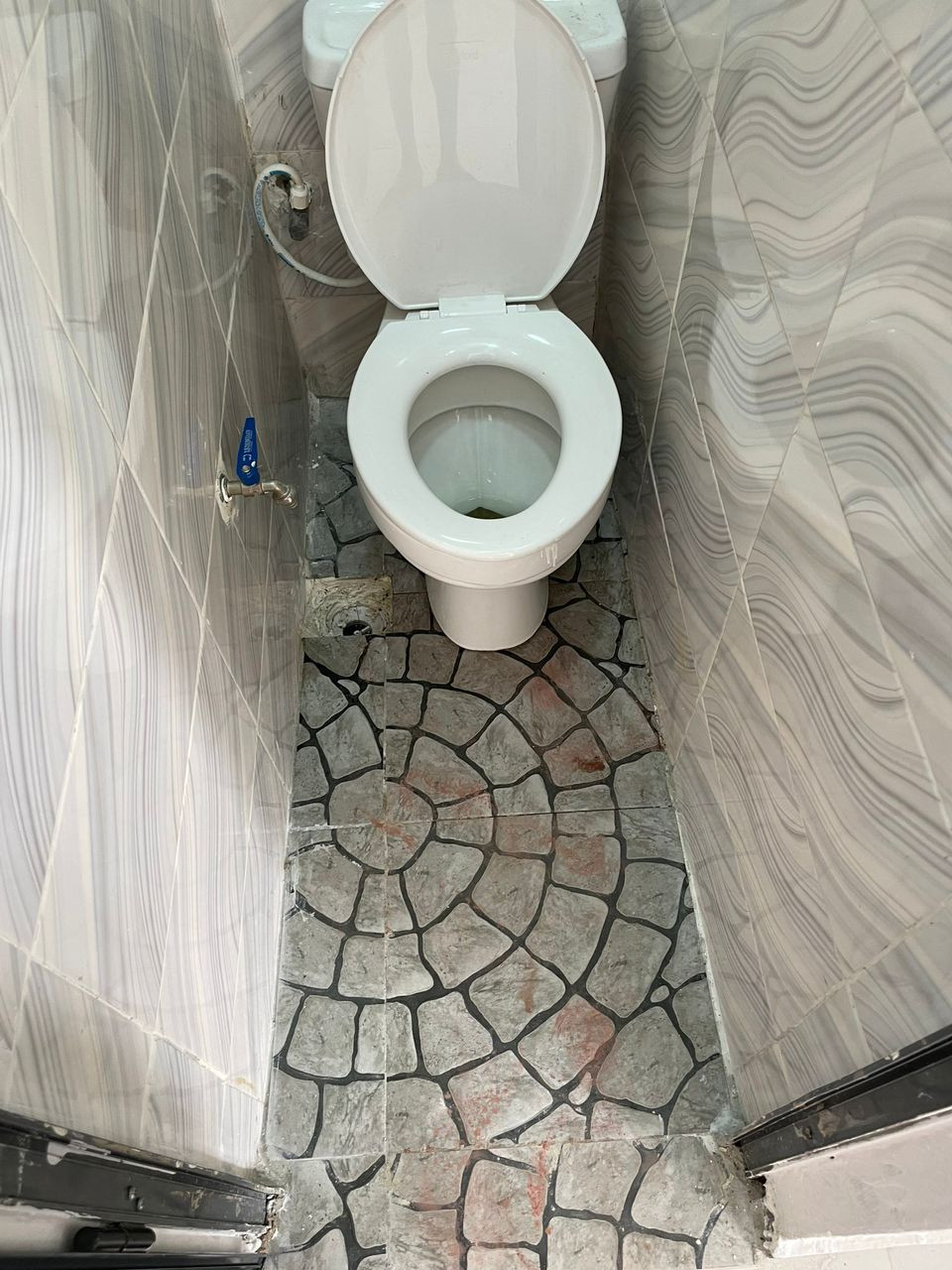 Twitter user shares photos of tiny toilet provided in an apartment put up for sale