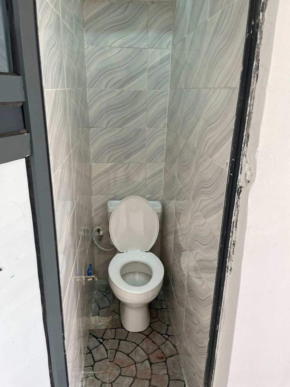 Twitter user shares photos of tiny toilet provided in an apartment put up for sale