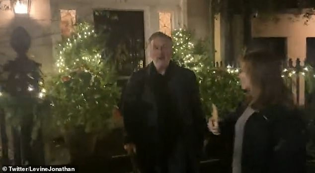 Watch Alex Baldwin angrily confront a reporter with umbrella after he