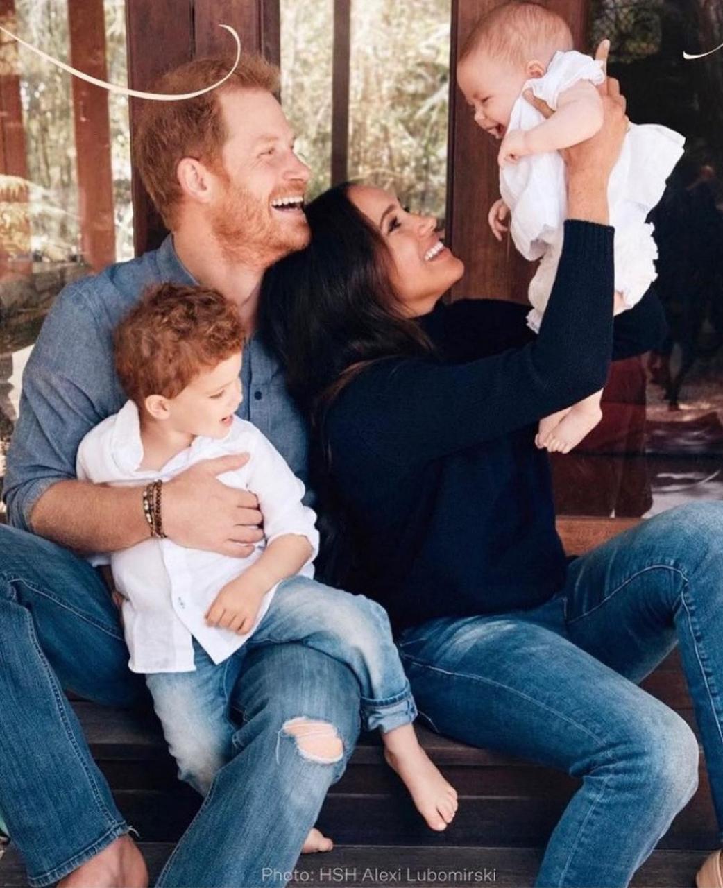 Prince Harry and Meghan Markle share first photo of their daughter as they release Christmas family photo