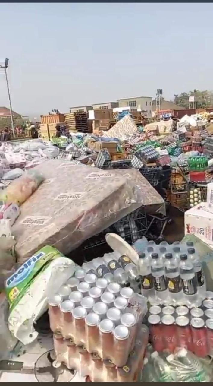 Goods worth millions retrieved by kind locals who intervened as Next Cash and Carry was razed by fire (photos/video)