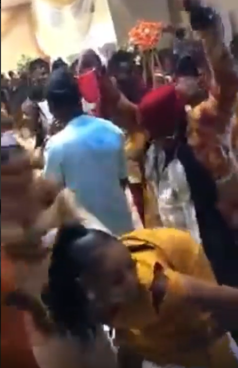Nigerian bride pushes away bridesmaid who was tw*rking on her husband