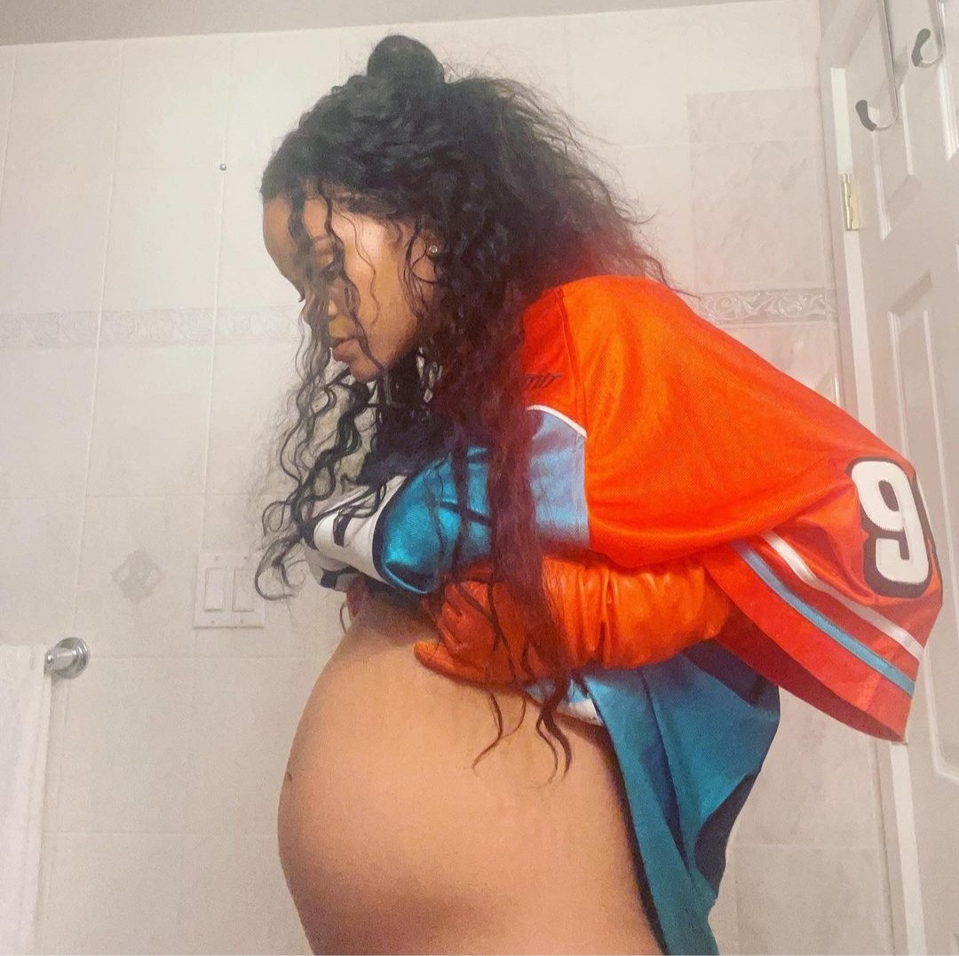 Rihanna shows off her growing baby bump in Instagram post