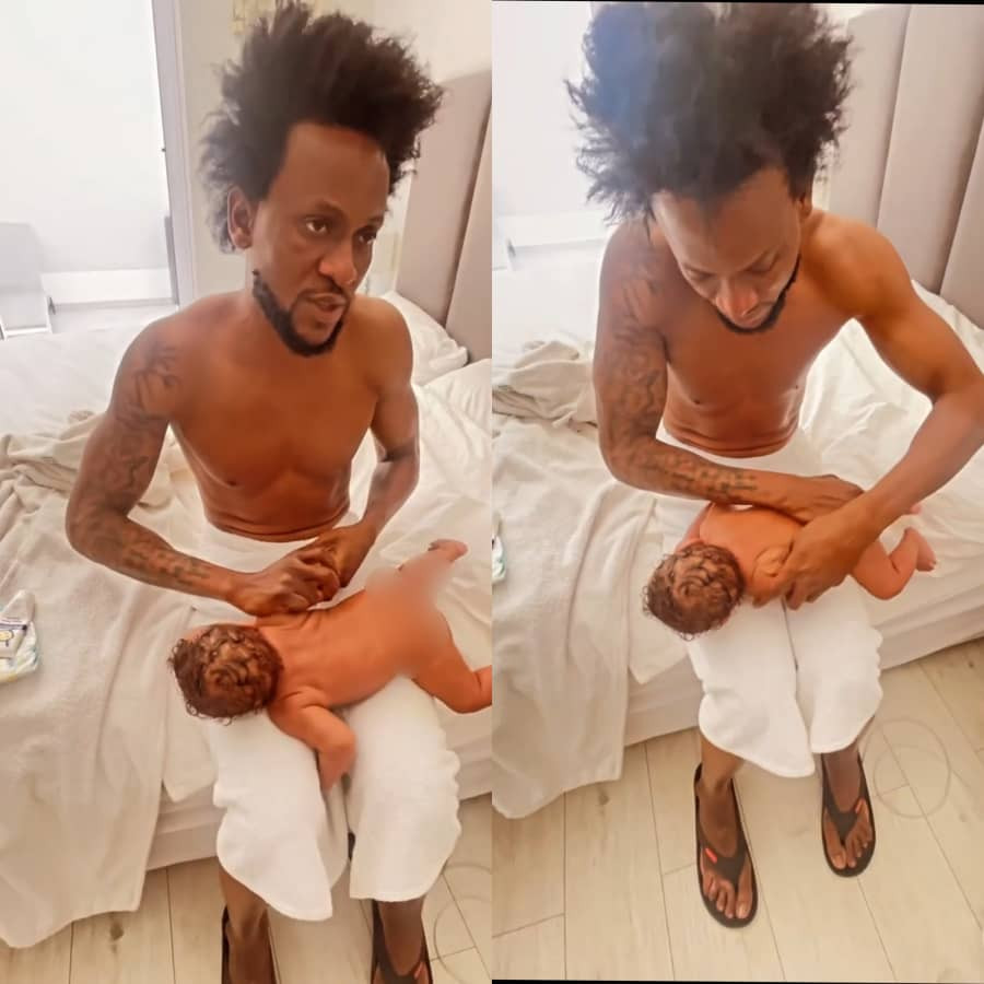 Reality TV star, Omashola, shares heartwarming video showing him massaging his baby, Eyitemi