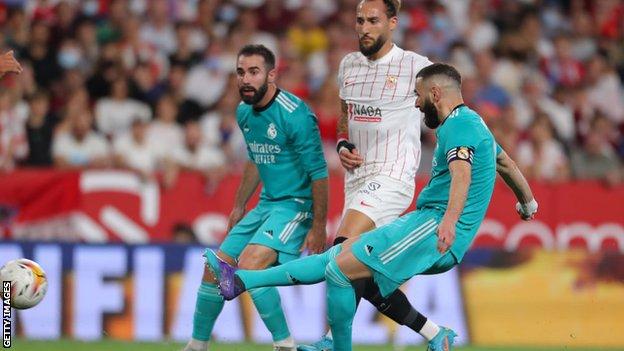 Karim Benzema, far right, scores the winner for Real Madrid