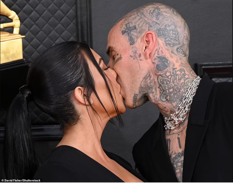 Grammys 2022: Kourtney Kardashian tongue-kisses Travis Barker on the red carpet as they pack on the PDA  (photos)