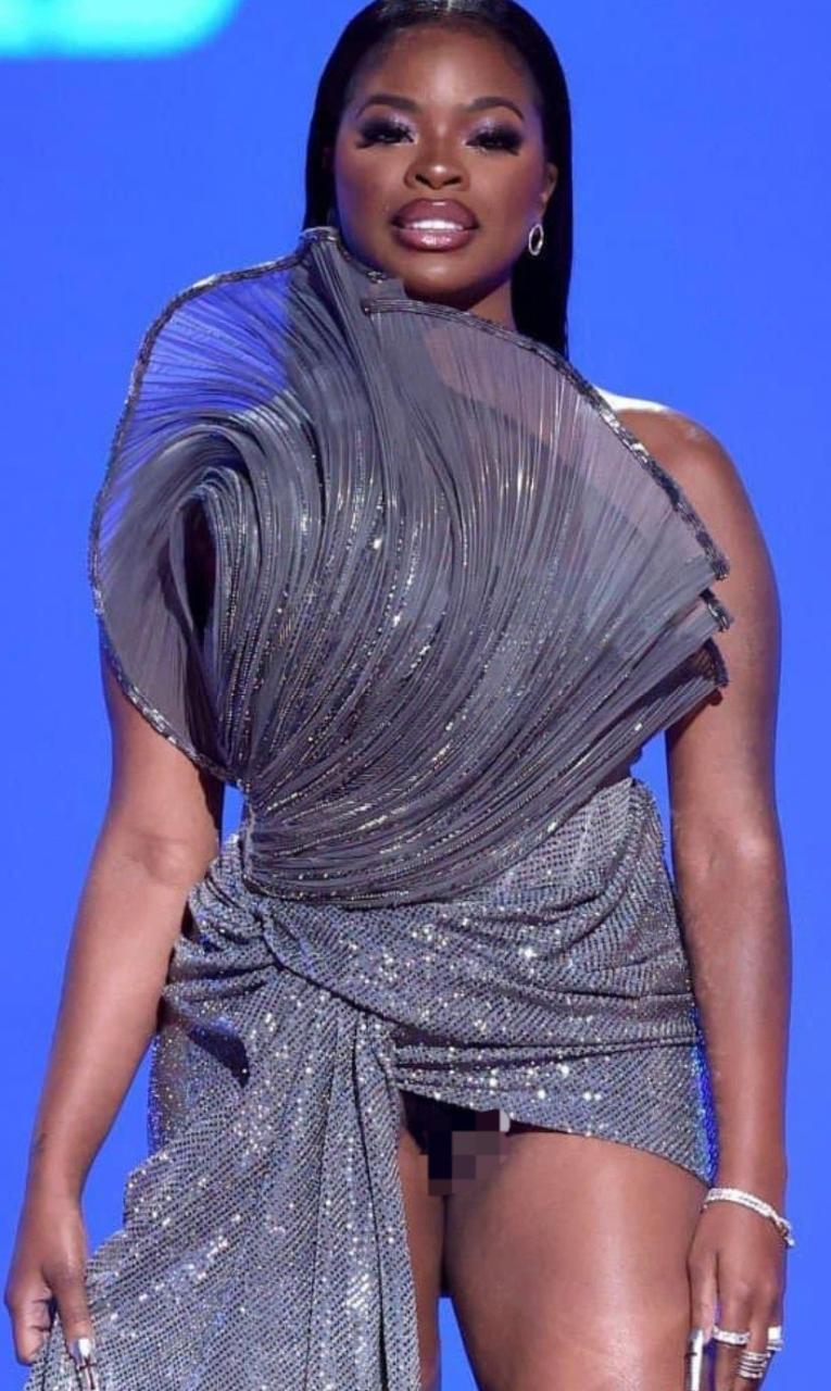 Rapper JT reacts after her lady part was accidentally exposed on stage at the Billboard Awards