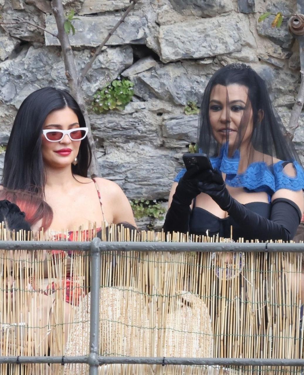 Kourtney Kardashian wears black veil and black dress with a picture of the Virgin Mary as she prepares to wed Travis Barker in Italy