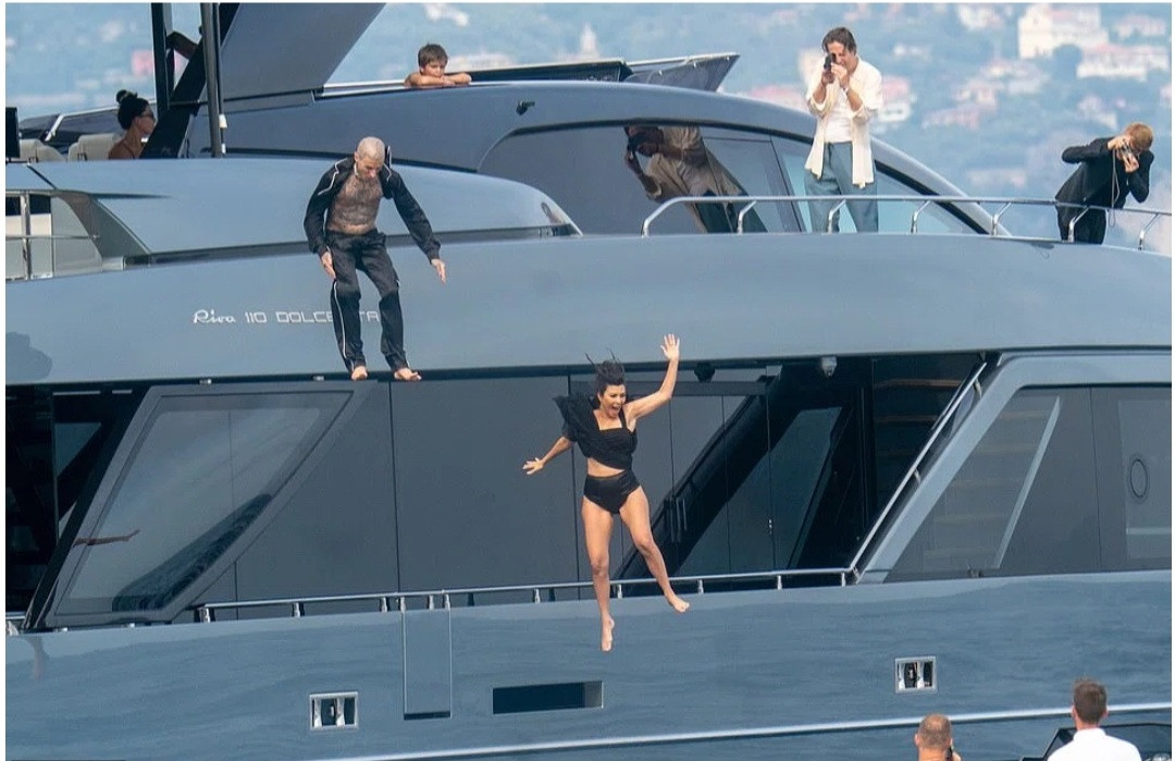 Kourtney Kardashian and Travis Barker enjoy romantic day on luxury yacht as they honeymoon in Italy