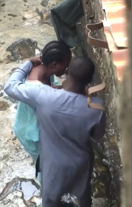 Nigerian man captured on camera forcefully brushing his wife