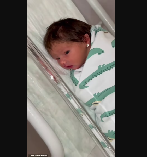 New mum heavily criticised for piercing her daughter