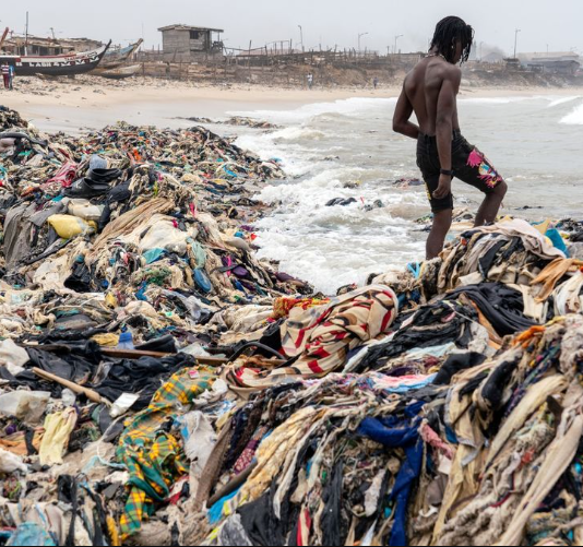Heaps of unwanted clothes from the UK wash up on Ghana