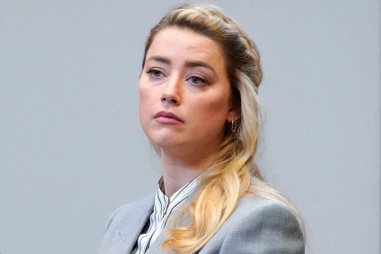 Amber Heard hires another lawyer in bid to force two insurance firms to pick up her $15m legal bill