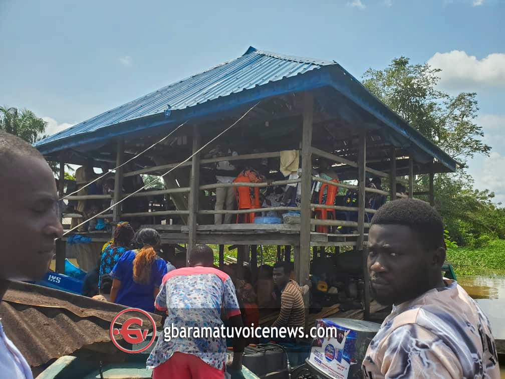 Delta couple performs their traditional marriage rites amidst flooding