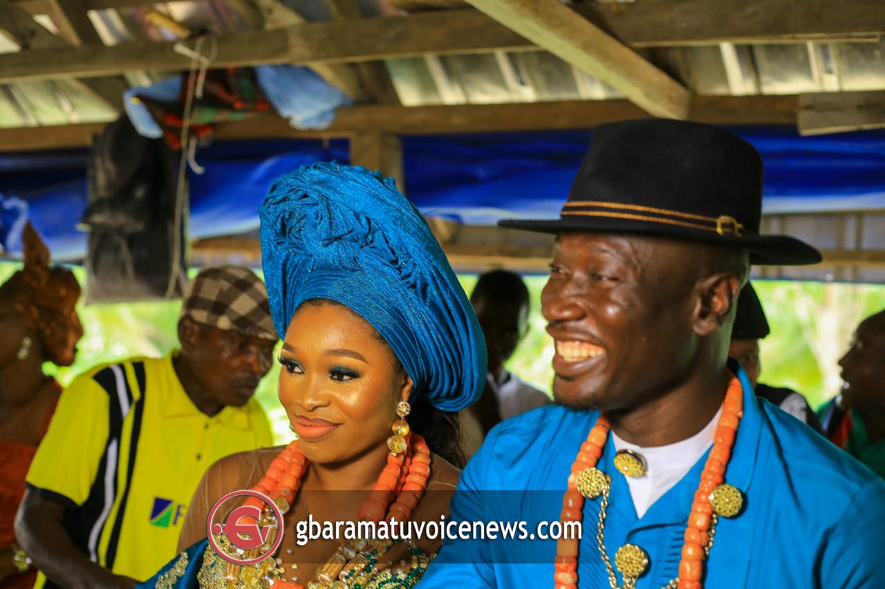 Delta couple performs their traditional marriage rites amidst flooding