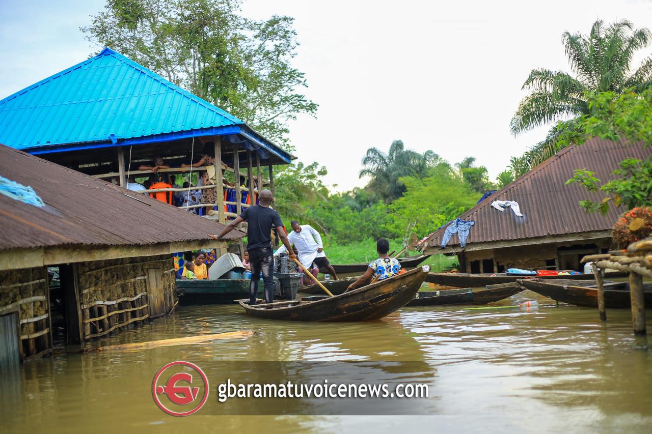 Delta couple performs their traditional marriage rites amidst flooding
