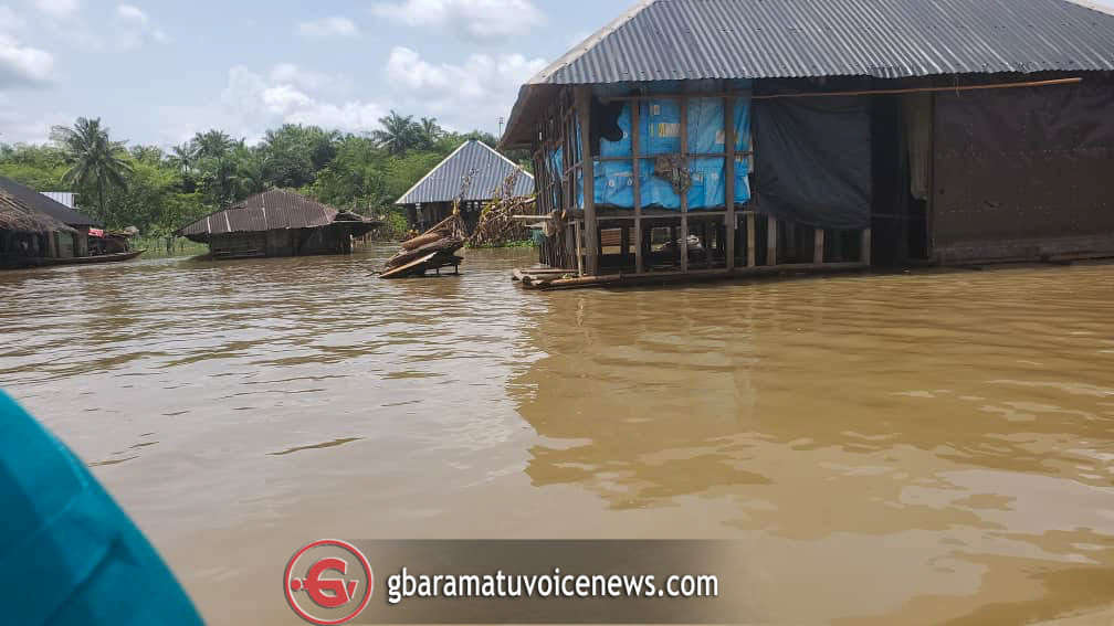 Delta couple performs their traditional marriage rites amidst flooding