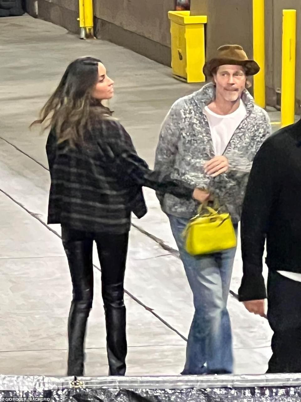 Brad Pitt spotted at Bono concert with Paul Wesley?s ex wife, Ines de Ramon