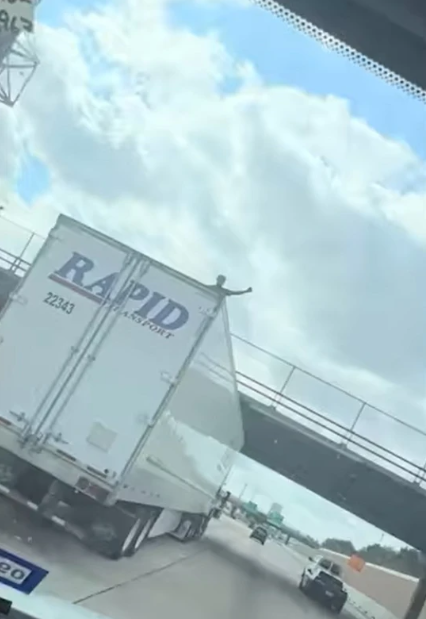 Man dancing?on top of a moving truck dies after hitting overpass