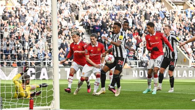 Manchester United keeper David de Gea makes a double save to deny Newcastle's Alexander Isak and Joe Willock