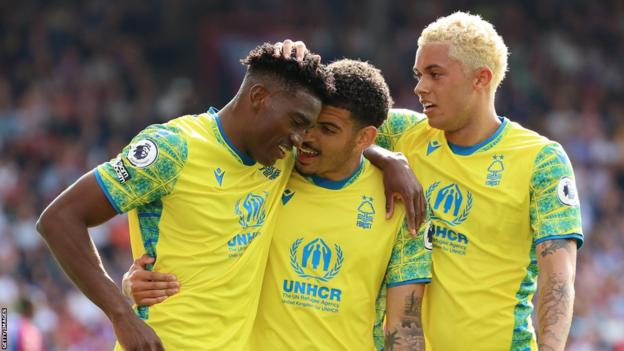 Taiwo Awoniyi of Nottingham Forest celebrates with teammates after scoring the team's first goal during the Premier League match between Crystal Palace and Nottingham Forest at Selhurst Park on May 28, 2023 in London, England.