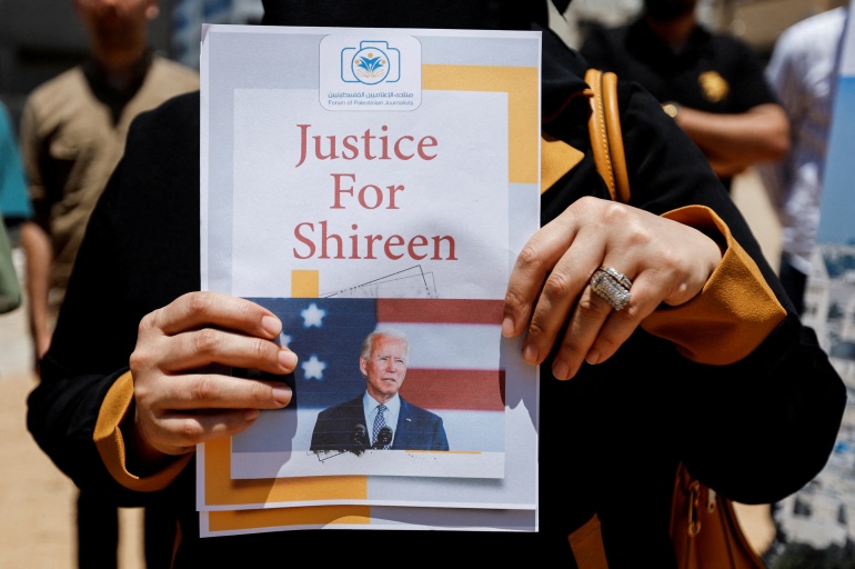 Sign with Biden's picture that reads, "Justice for Shireen"