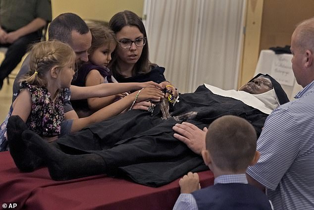 Thousands of Catholics flock to Missouri church to pray over body of 