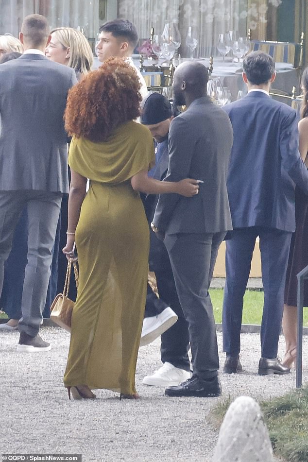 See more photos of Rapper Megan Thee Stallion and football star Romelu Lukaku holding hands at his teammate