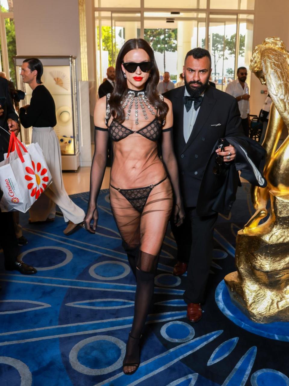 Super model Irina Shayk steps out at the Cannes Film Festival in a see-through dress  (photos)