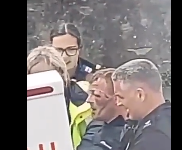 Watch Police officer punch man in the head nine times while restraining him in chokehold (video)