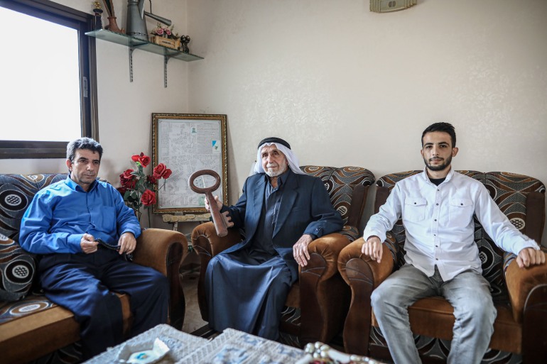 A grandfather, his son and his grandson 