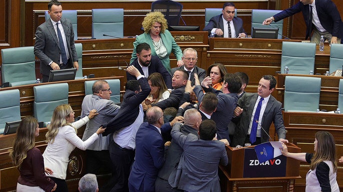 Fight erupts at Kosovo parliament after opposition lawmaker splashes water on prime minister (video)
