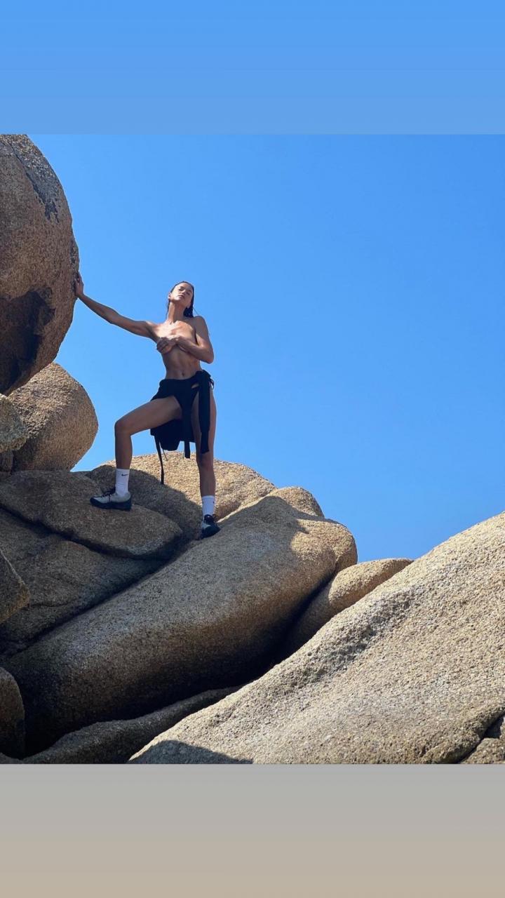 Topless Irina Shayk shared photos of vacation with shirtless ex Bradley Cooper despite being romantically involved with Tom Brady