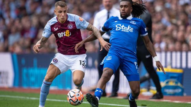 Alex Iwobi challenges Lucas Digne