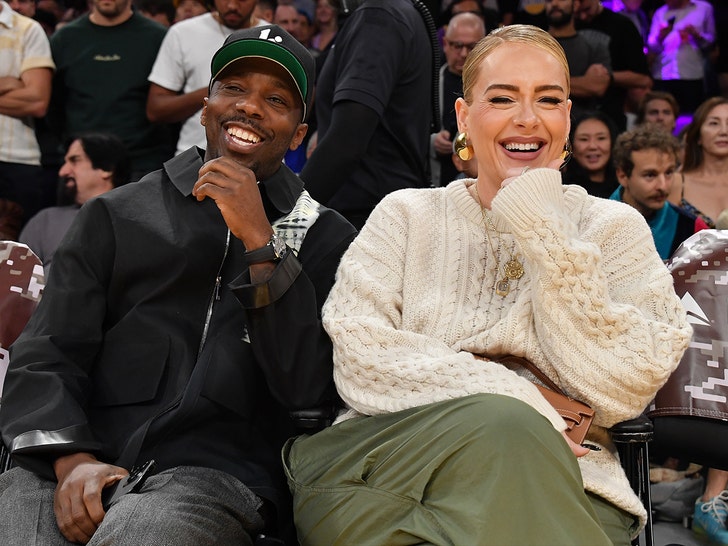 Adele flashes ring at Lakers Game